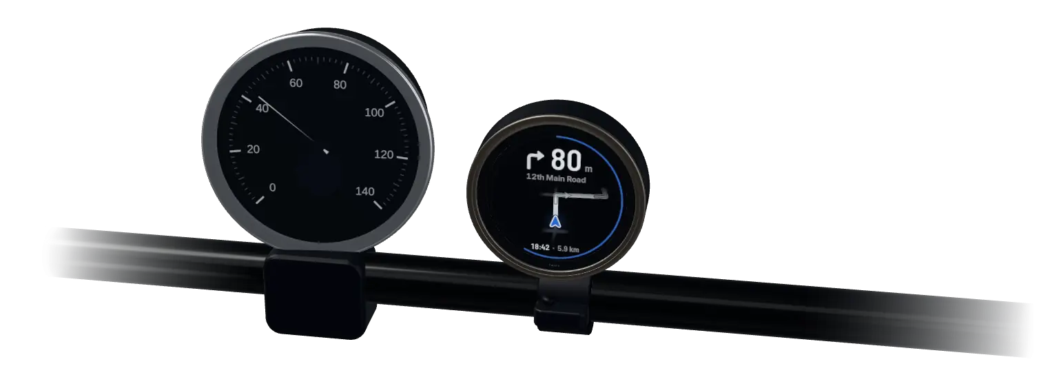 Illustration of the rider’s view: the TRIPX pod clamped on the handlebar to the right of a round speedometer.